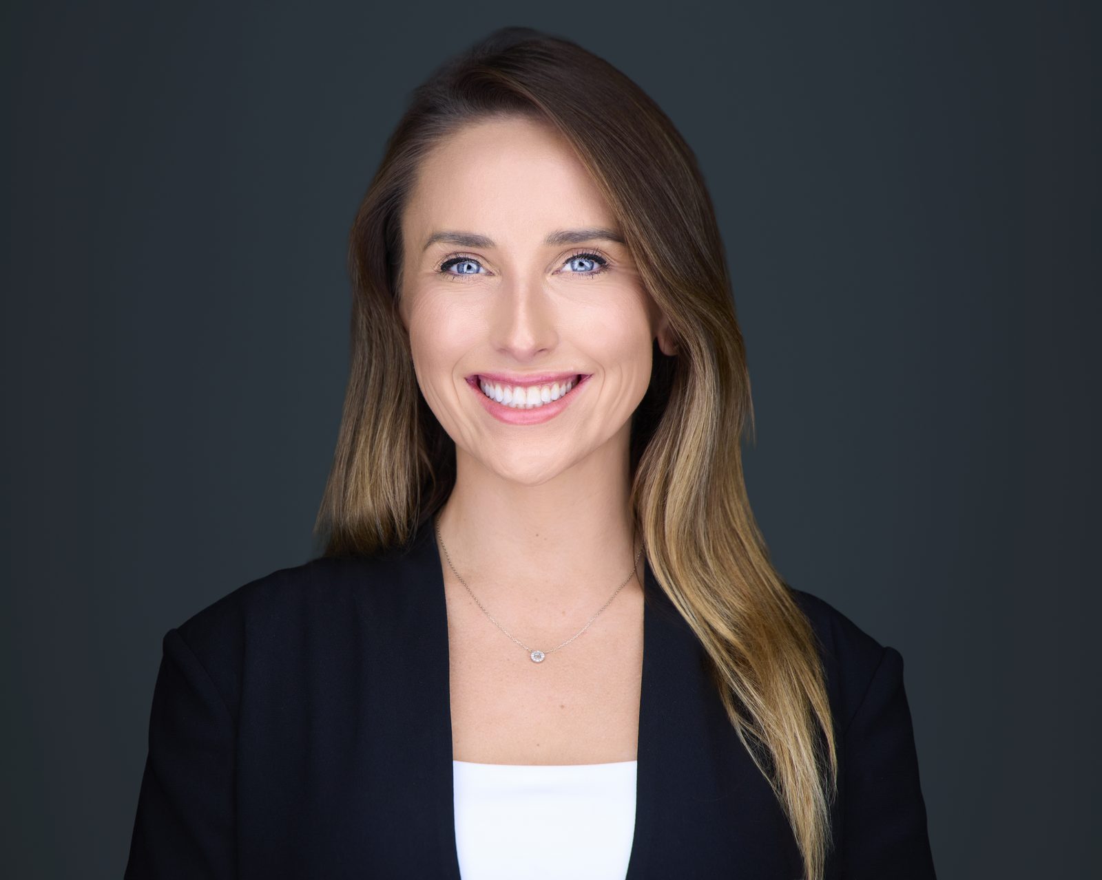 Studio headshot with natural expression coaching