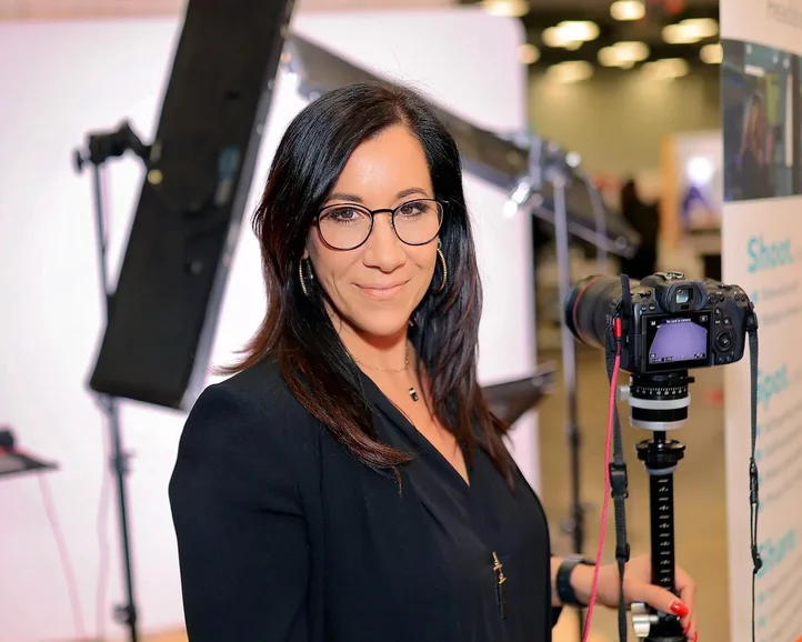 Professional conference headshot captured at Austin event