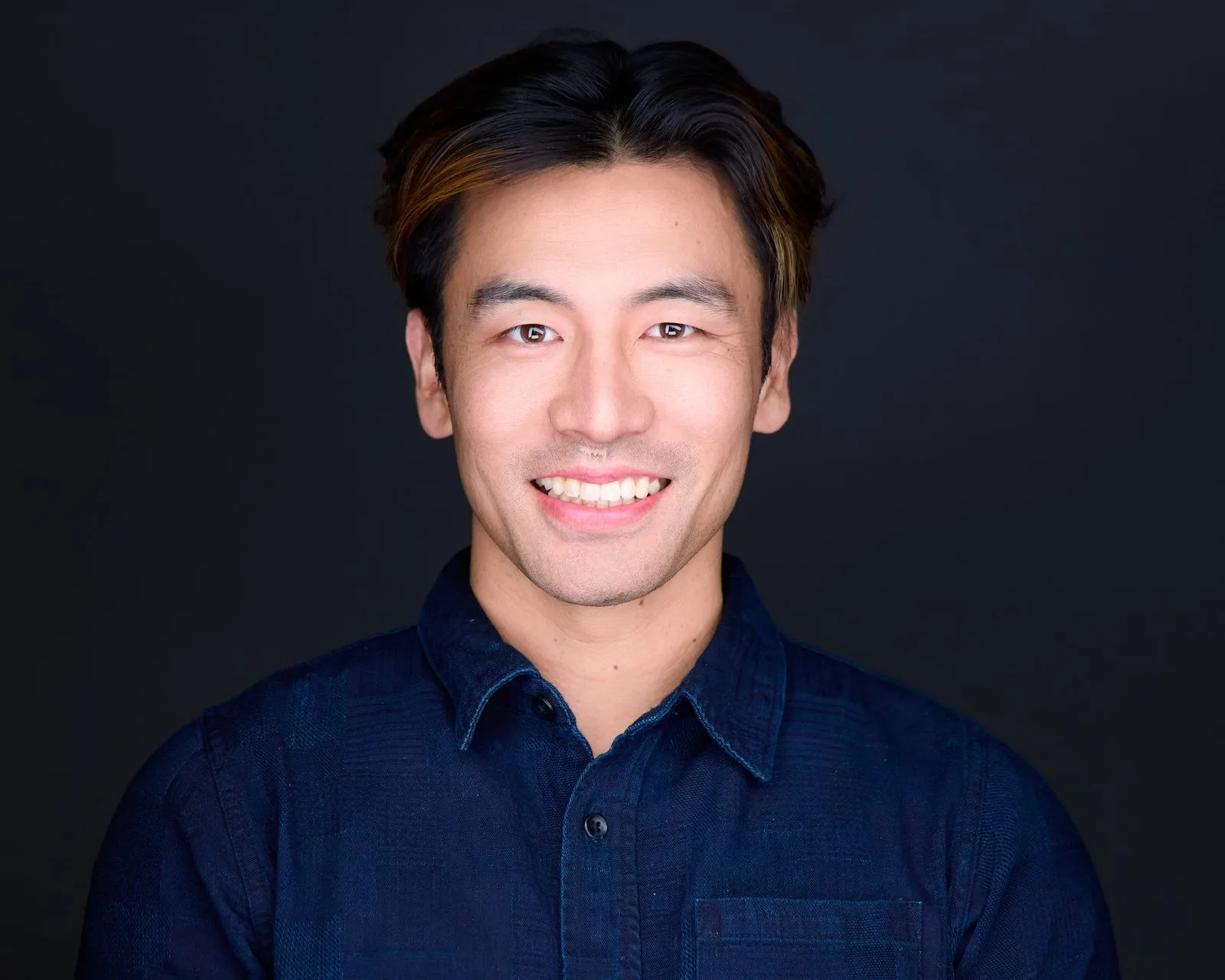 Corporate headshot with natural expression