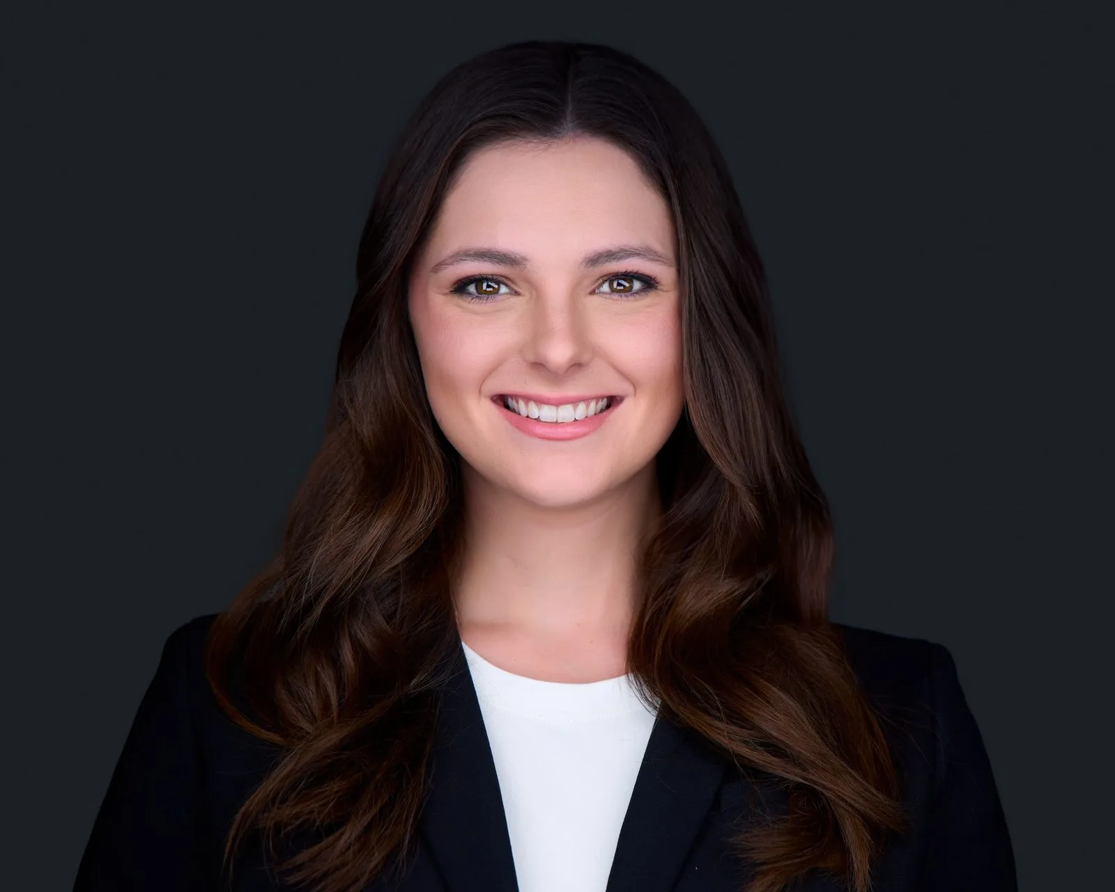 Professional corporate headshot with studio lighting